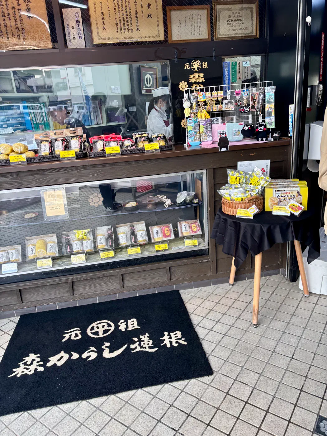 Trying Kumamoto’s local specialty, karashi renkon (mustard-stuffed lotus root).